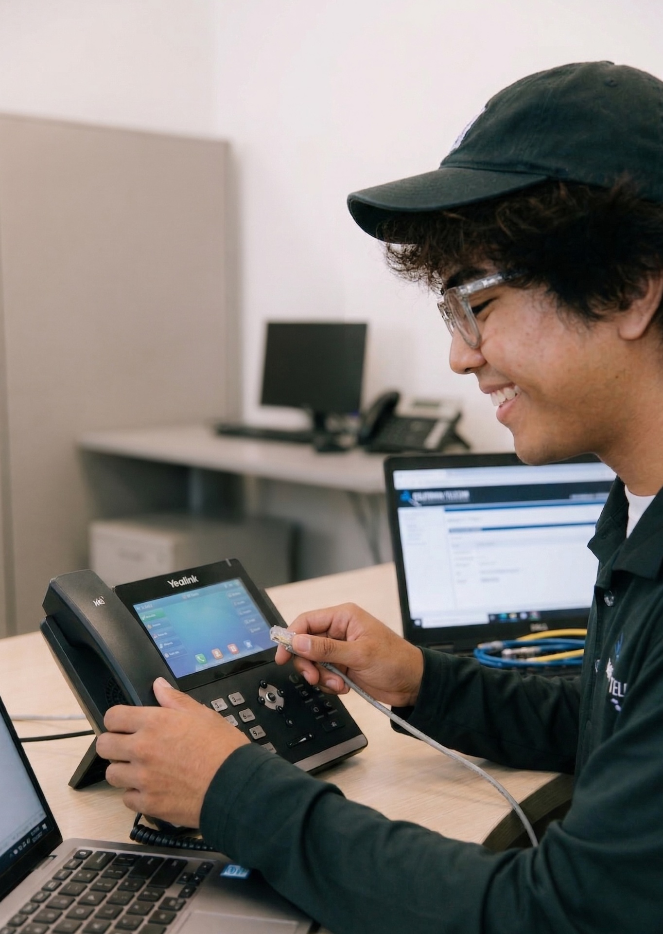 Nathan configuring a Yealink phone