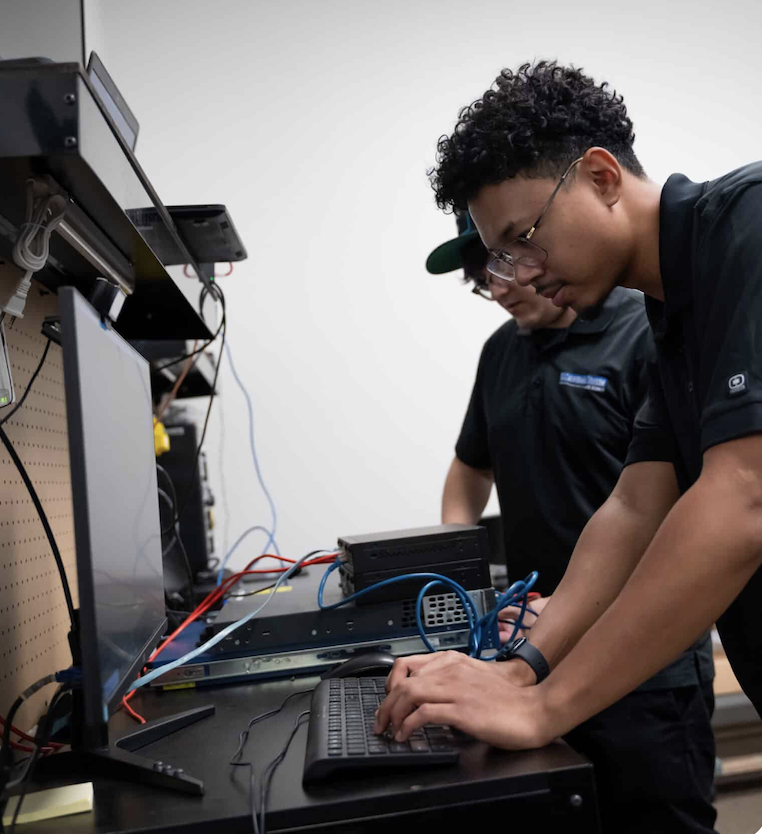 Technicians configuring equipment